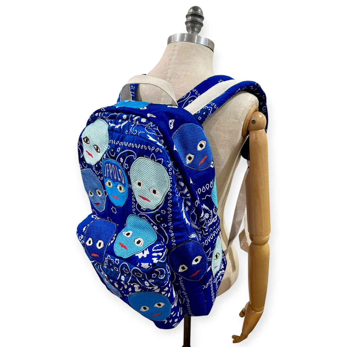 Plastered Faces Backpack Blue Paisley 1/1